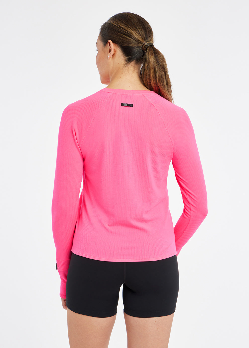 Flyout Long Sleeve in Neon Pink, back view