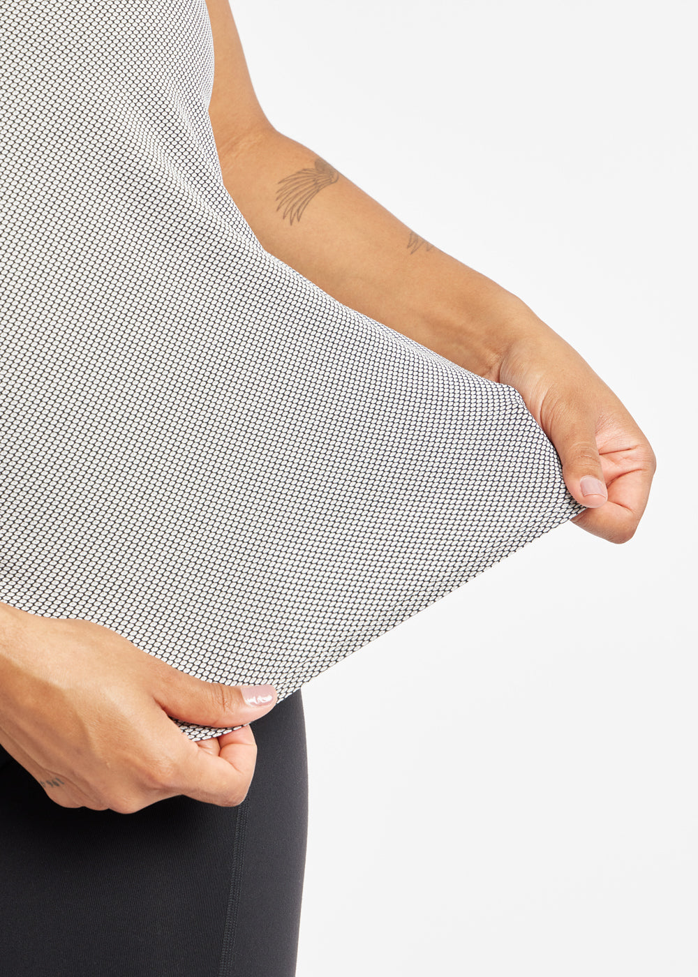 Flyout Racerback Running Tank in Black/White, fabric detail close up