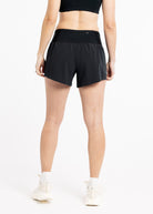 Running Shorts 4.25" inseam in black, back view