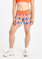 Roga 6" Running Shorts in colorful checkered print with orange waistband, front view