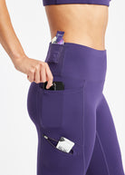 Woman wearing purple knickers in size 6, close up view of side pockets