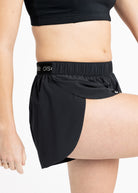 Close up of running shorts on the split side feature