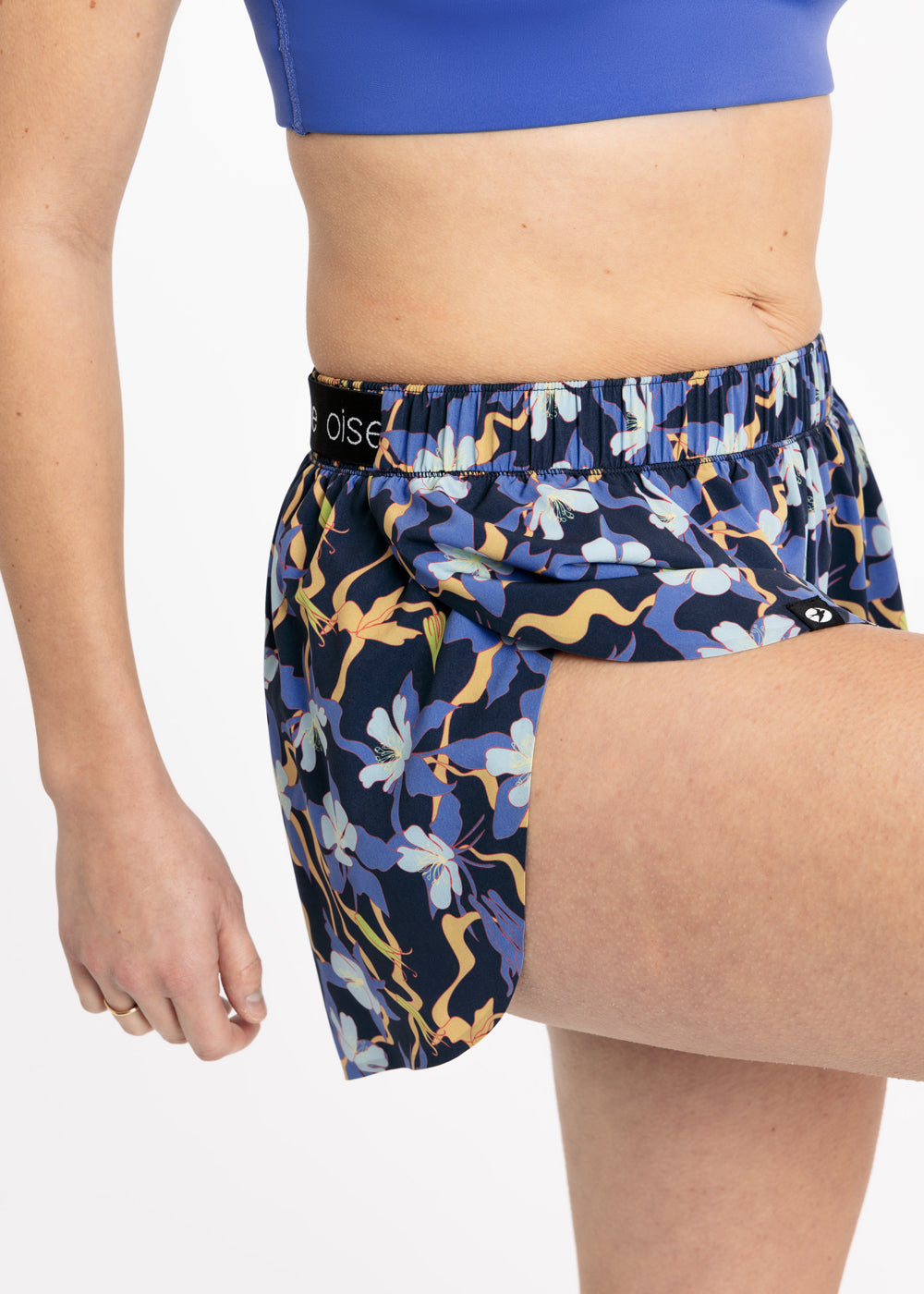 Close up of running shorts on the split side feature