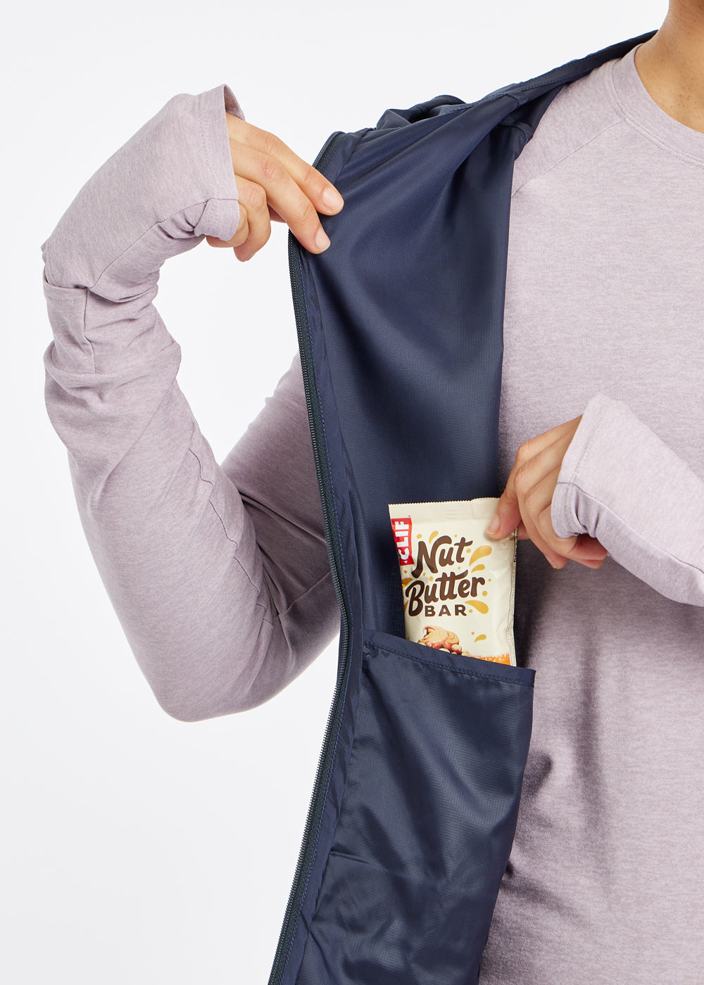 Whirlwind Vest, a wind resistant running vest in Ink Blue, pocket view