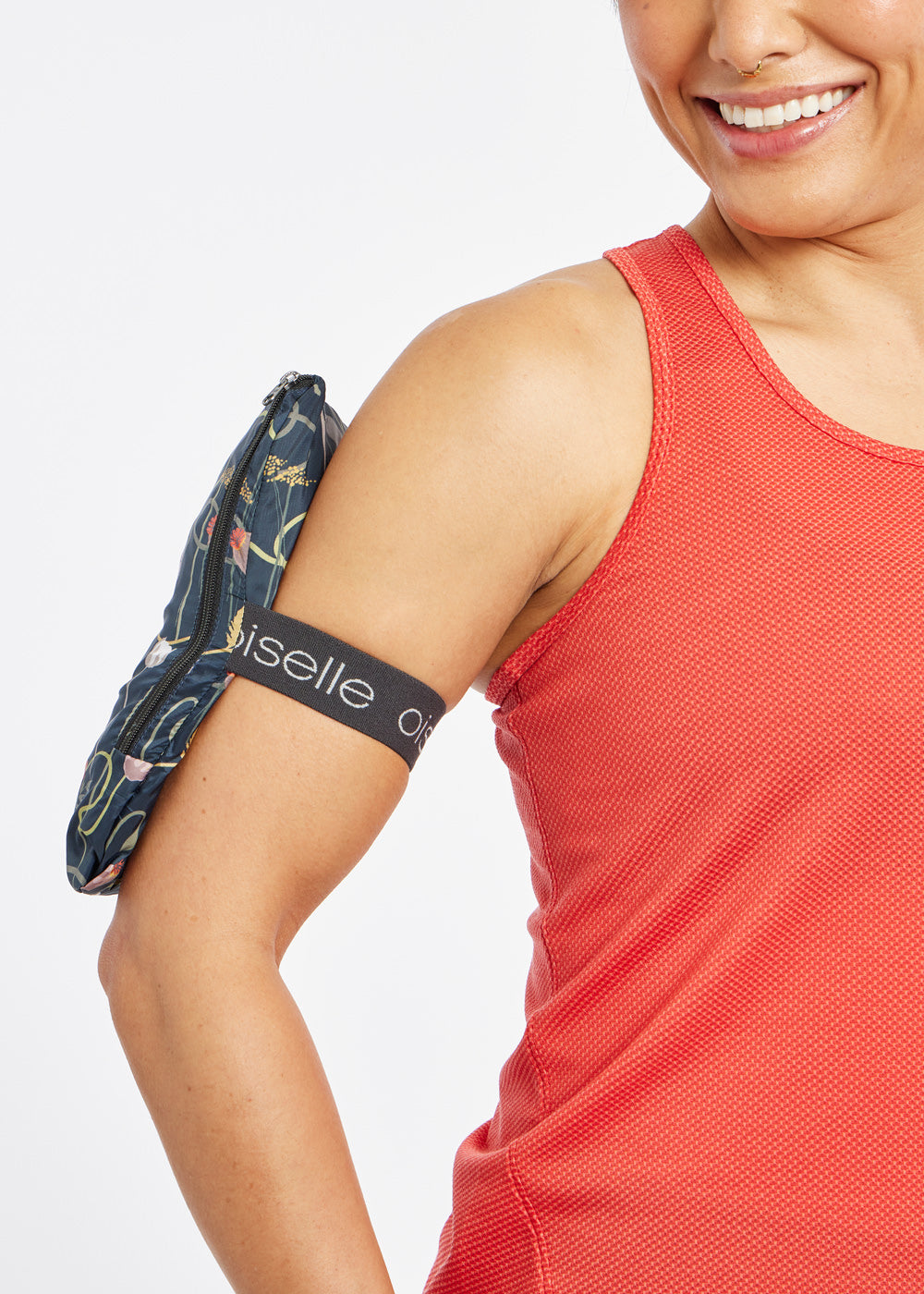 Whirlwind Jacket, a wind resistant running jacket in flower print, packable