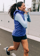 Whirlwind Running Vest in Blue Rapids, woman running view