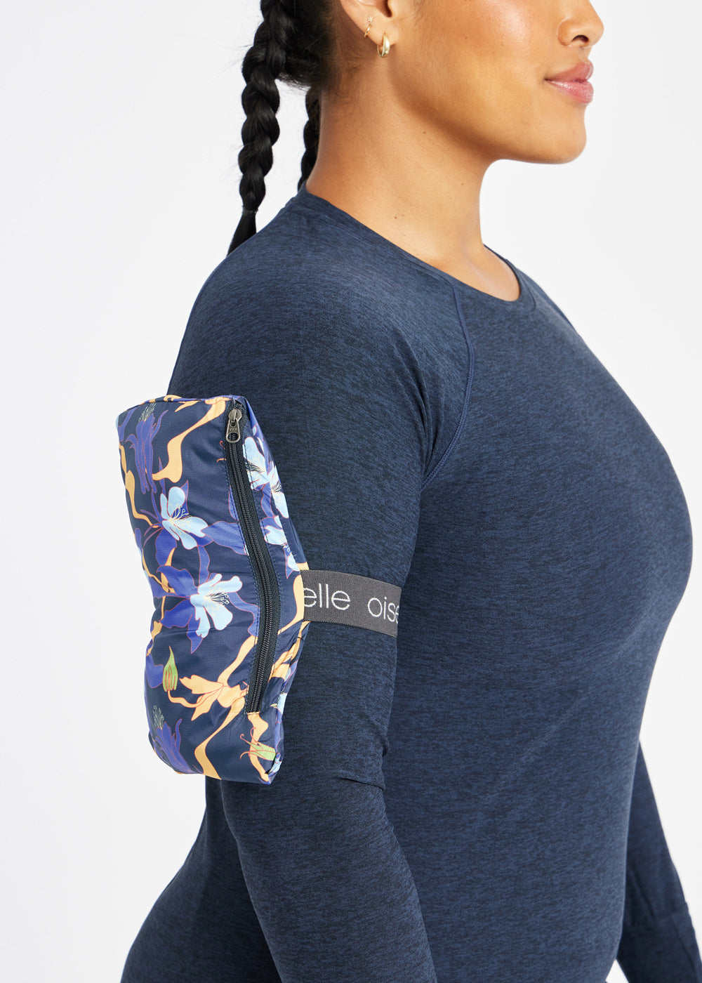 Whirlwind Running Vest in Ink Blue Aquila Bloom Floral Print, packable detail view