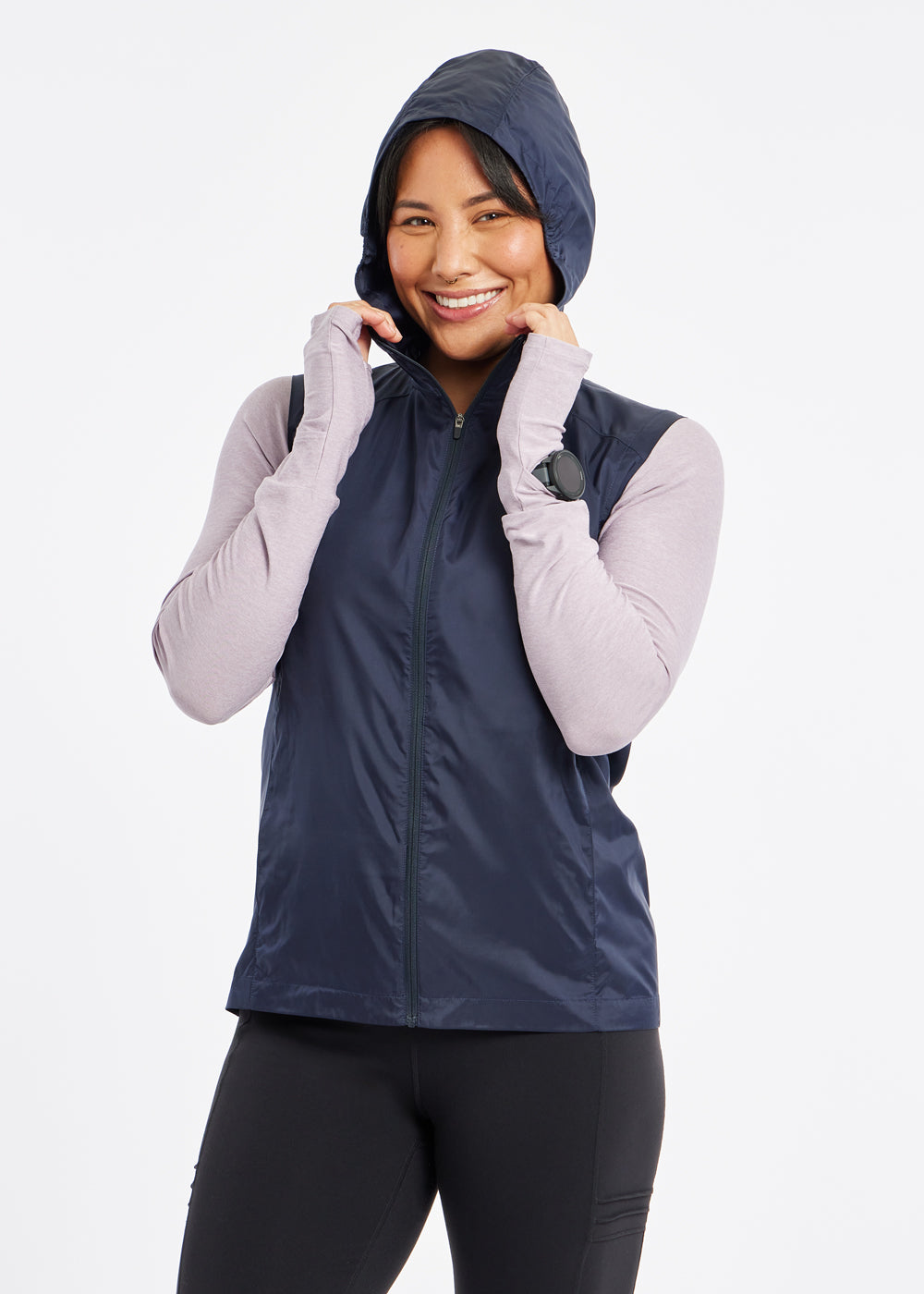 Whirlwind Vest, a wind resistant running vest in Ink Blue, front view with hood