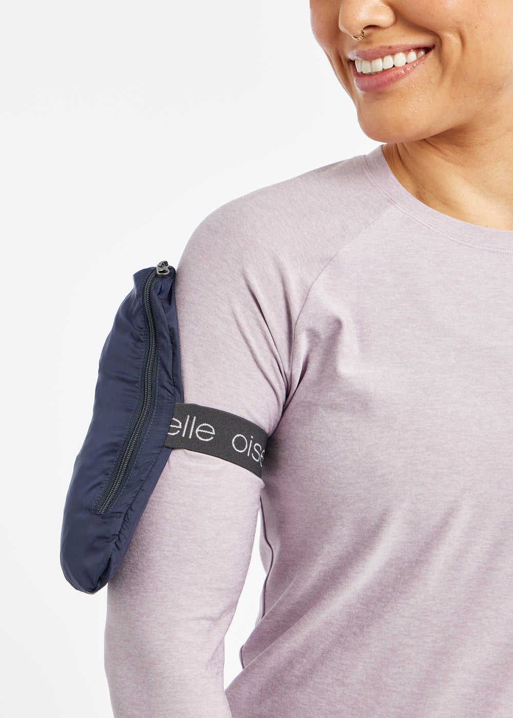 Whirlwind Vest, a wind resistant running vest in Ink Blue, packable