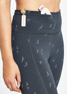 Firecracker Reflective Tights in Black, front pocket detail