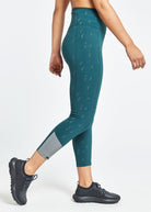 Firecracker Reflective Tights in Juniper green, side view